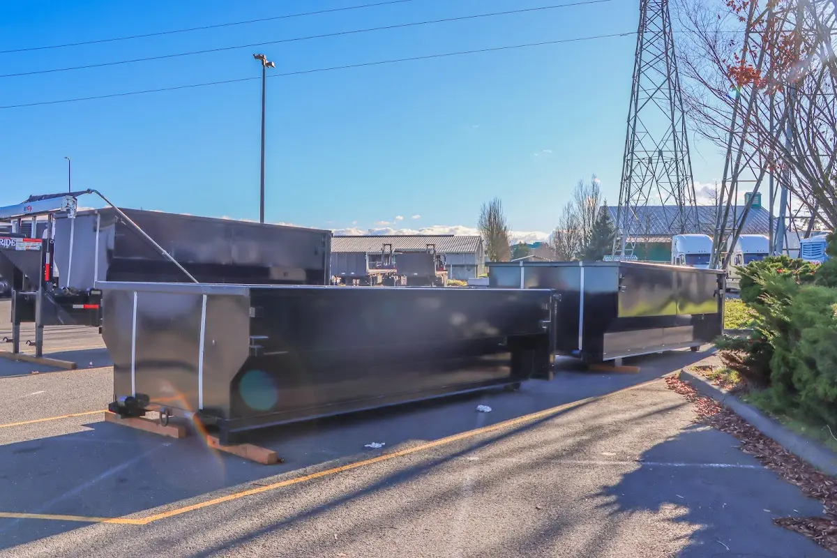 Roll-off dumpster ready for waste disposal at job site for 2 Yard Dumpster Rental in Oneida